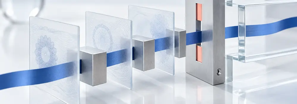 Translucent authentication layers and a blue data ribbon passing through a narrow metal transport boundary.